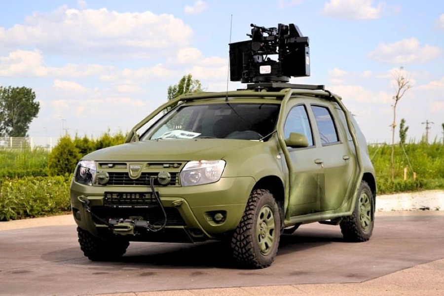 Standard SUV retrofitted with a roof-mounted autonomy and sensor kit